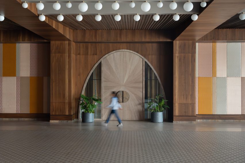 Brocade panels on wood walls