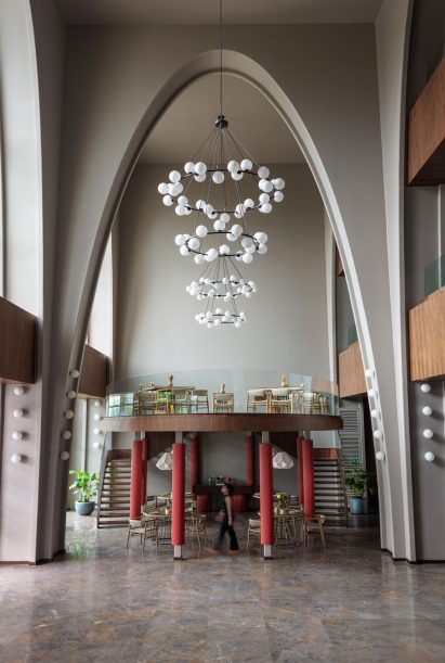 Sculptural white lighting above cafe
