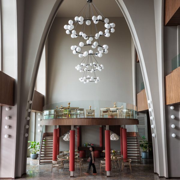 Community hall with sculptural lamps