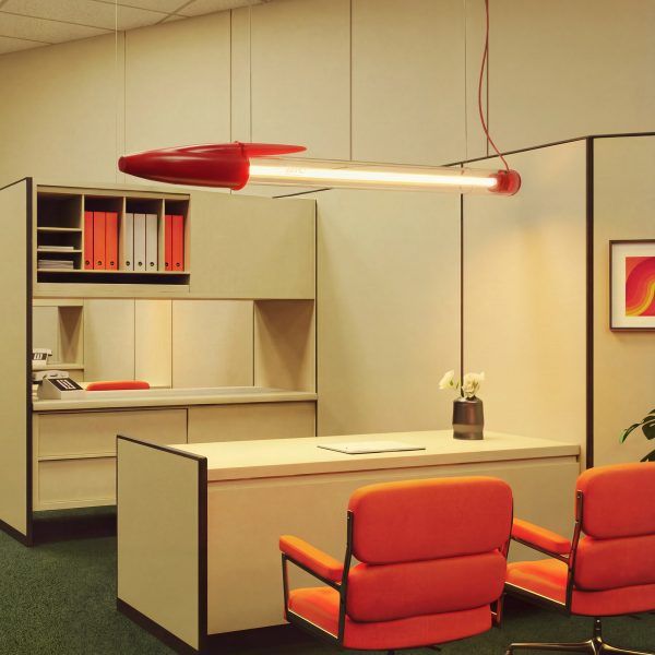 Pen-shaped lamp suspended from the ceiling in a retro-style office