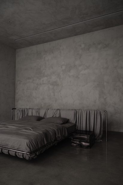 Monochrome bedroom interior at family home by Studio Nirvana