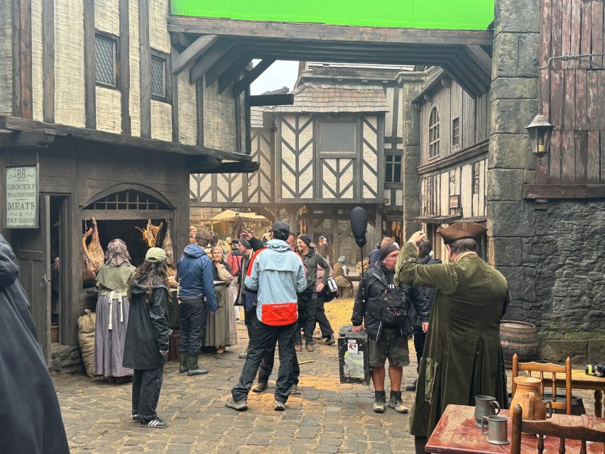 Behind-the-scenes photo of filming of The Testament of Ann Lee in a tudor-style set
