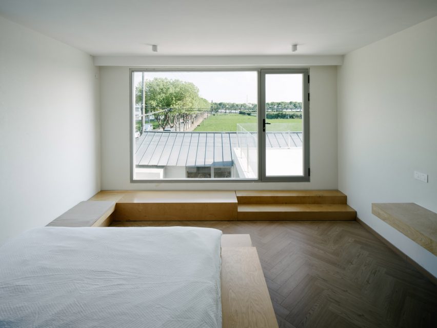 Guest bedroom with wooden finishes