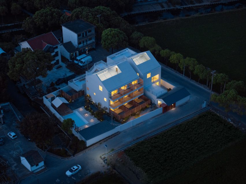 Guesthouse from above illuminated at night