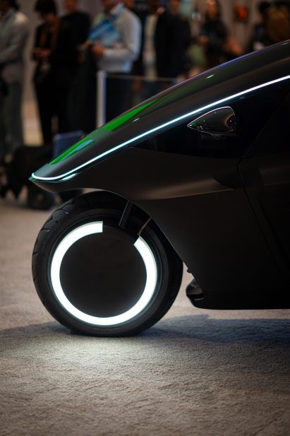 Photo of the front of the Trinity three-wheeler vehicle on display at CES