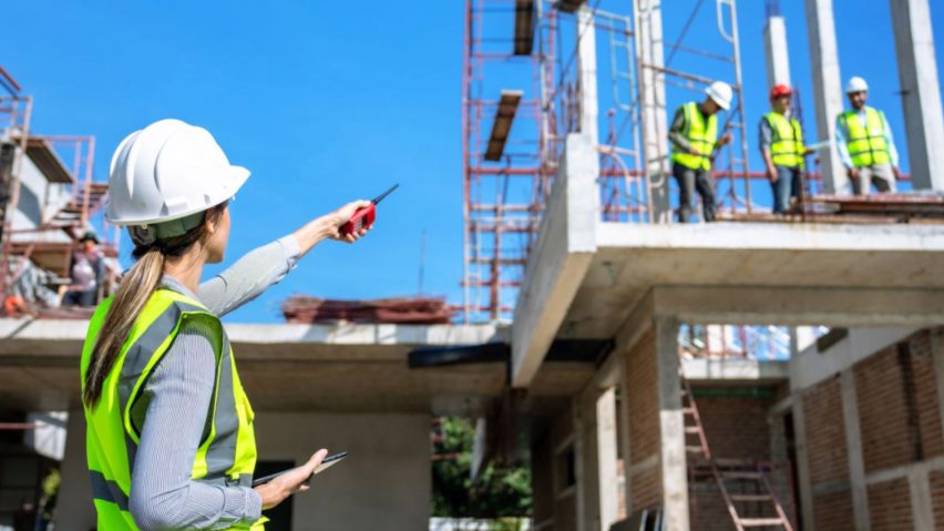 Photo of people on a construction site