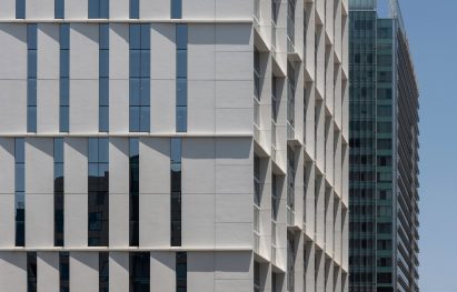 High-rise building with white external louvres