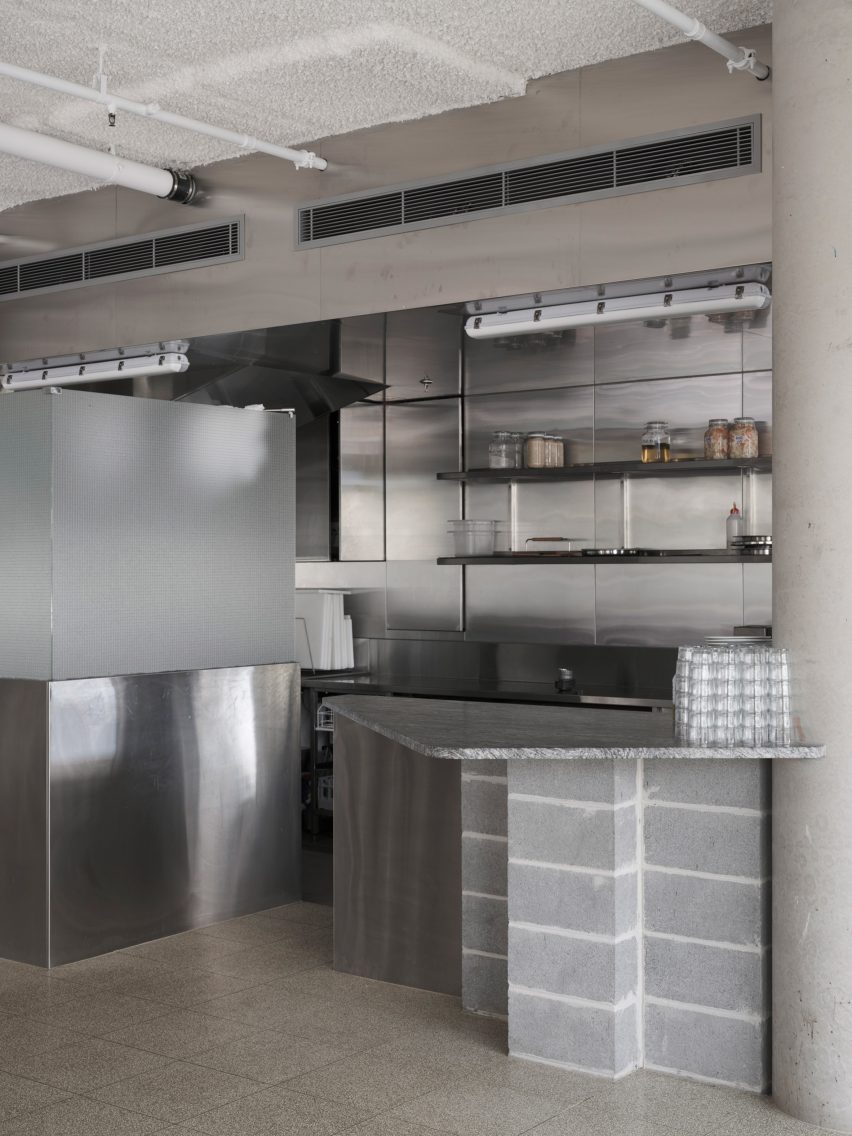 Kitchen with concrete and metal surfaces