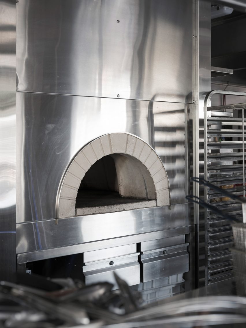 Kitchen with concrete and metal surfaces