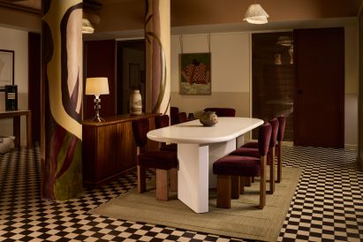 Lounge with chequered floor and white table