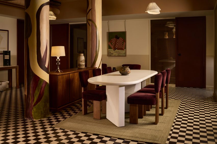 Lounge with chequered floor and white table