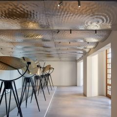Undulating metal ceiling in art gallery
