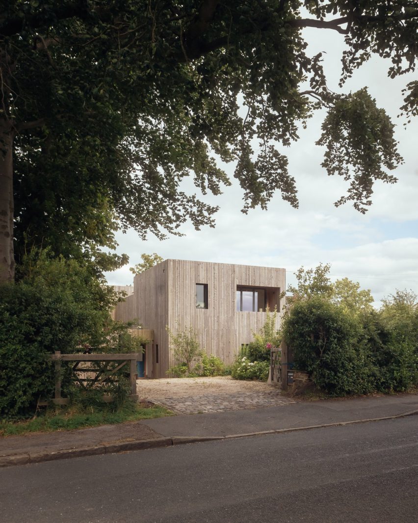Larch-clad exterior of Orchard House designed by Studio Bark