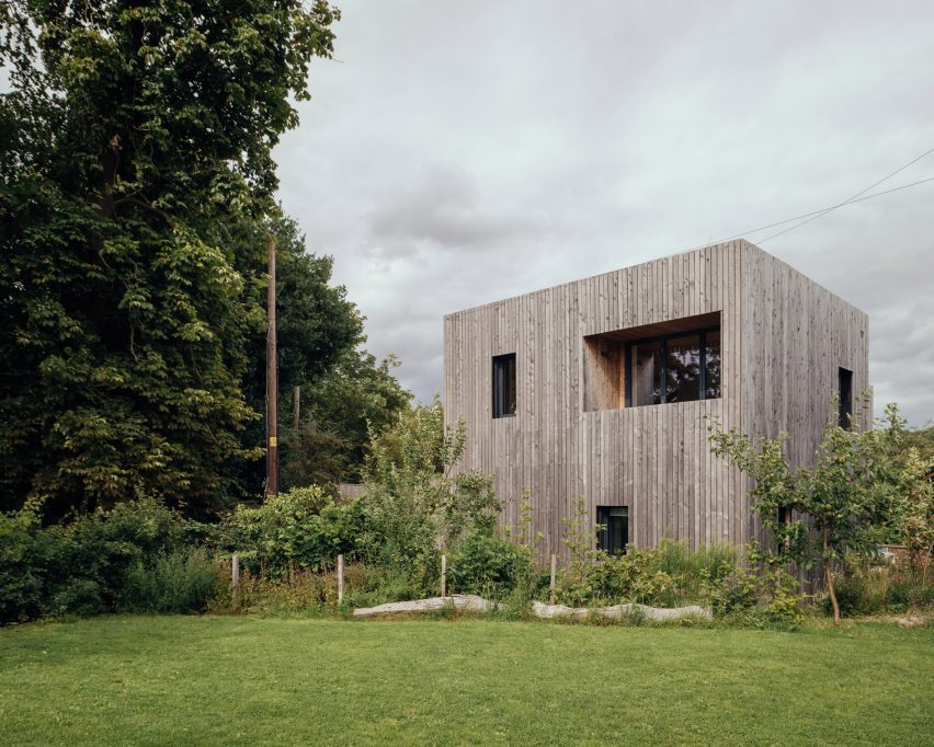 Larch-clad exterior of Orchard House designed by Studio Bark
