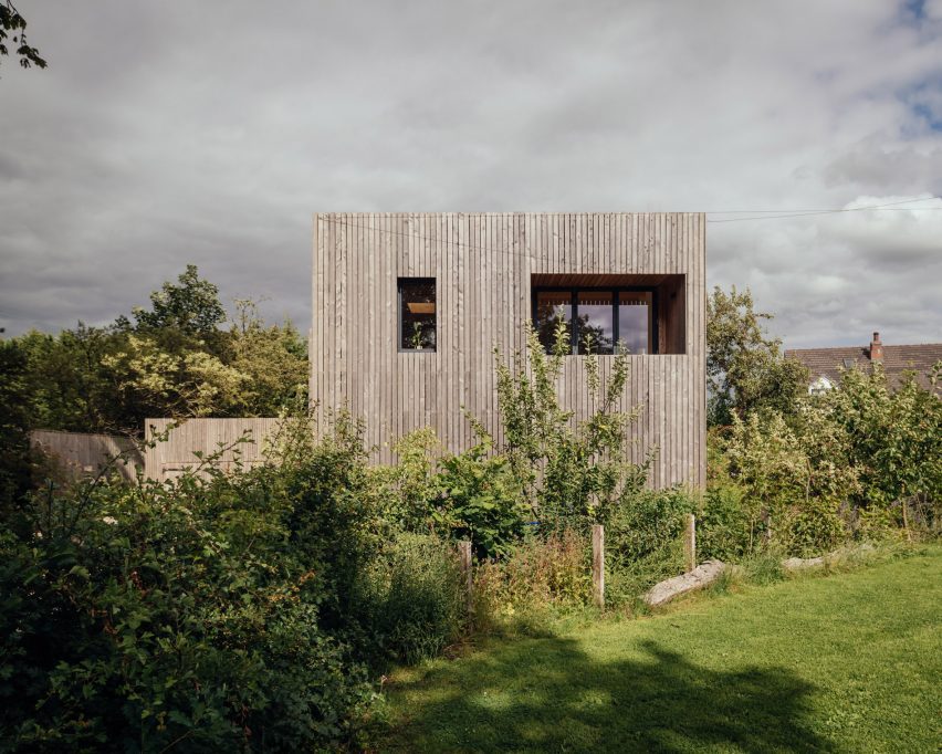 Larch-clad exterior of Orchard House designed by Studio Bark