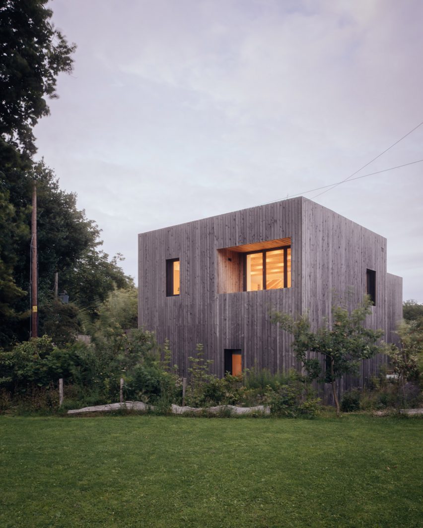 Larch-clad exterior of Orchard House designed by Studio Bark