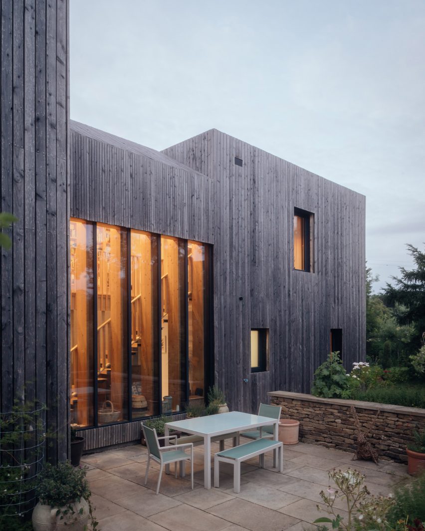 Larch-clad exterior of Orchard House designed by Studio Bark