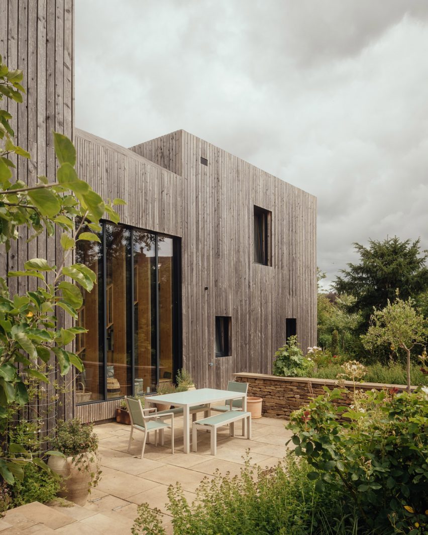 Larch-clad exterior of Orchard House designed by Studio Bark