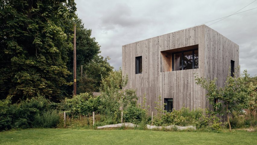 Larch-clad exterior of Orchard House designed by Studio Bark
