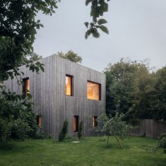 Larch-clad exterior of Orchard House designed by Studio Bark