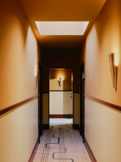 Hallway of hotel in Berlin by Rachael Gowdridge