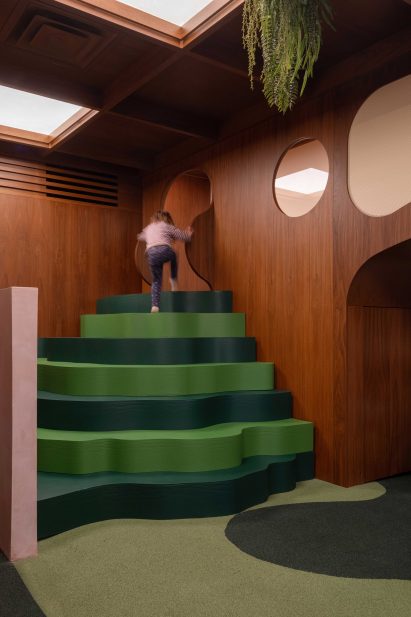 Green foam steps leading to a mezzanine hideout