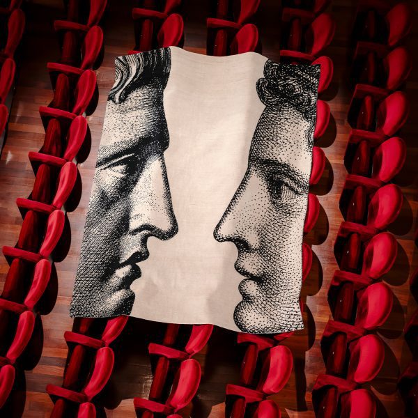 Rug designed by CC-Tapis and Fornasetti displayed over auditorium seats