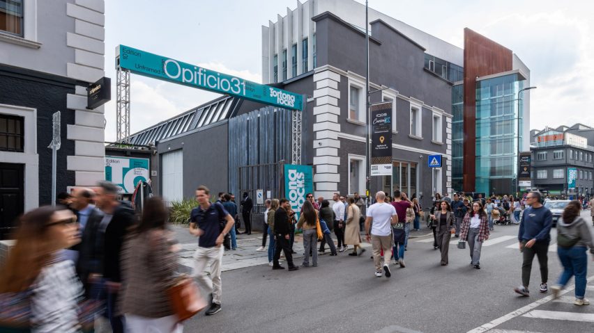 People walking on the street outside event venue