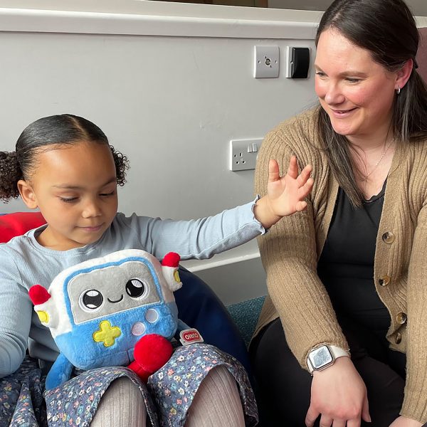 A mother and child play with a cuddly soft toy for the AI in the Early Years study at the University of Cambridge