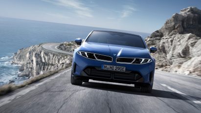 Photo of the BMW i3 seen from the front showing a minimal kidney grill with integrated lighting