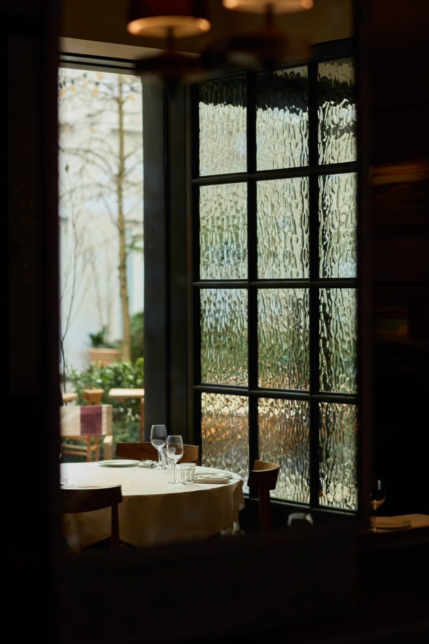 Glass door at Burro restaurant designed by Day Studio
