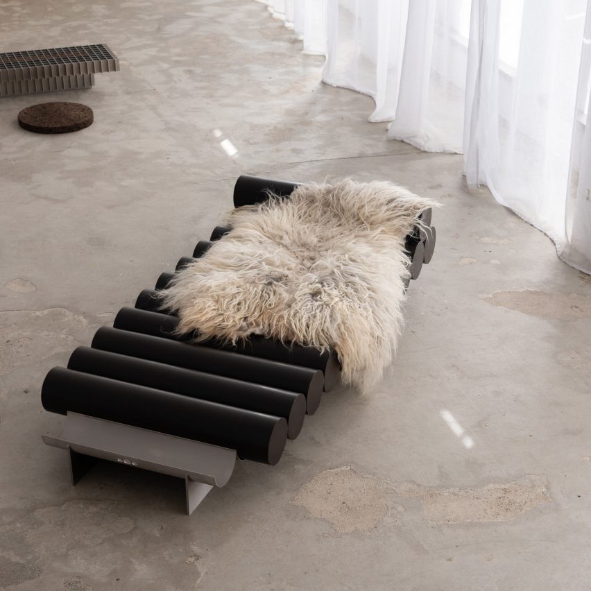 Wax daybed with sheepskin throw