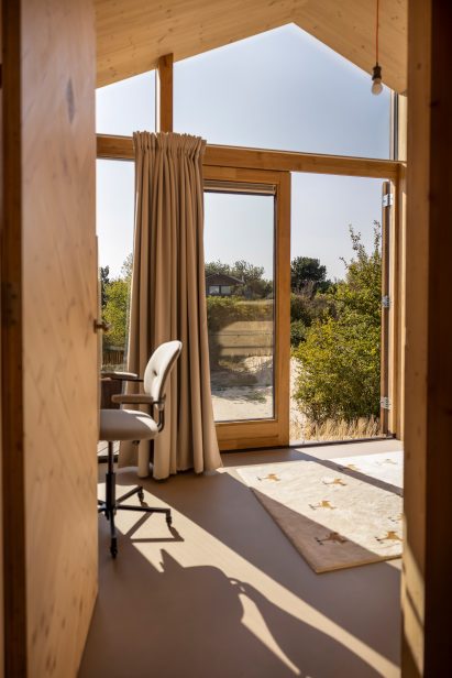 A brightly lit room on the dunes.