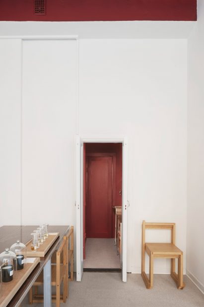 Red room in En Doft store in Stockholm by All Matters Studio