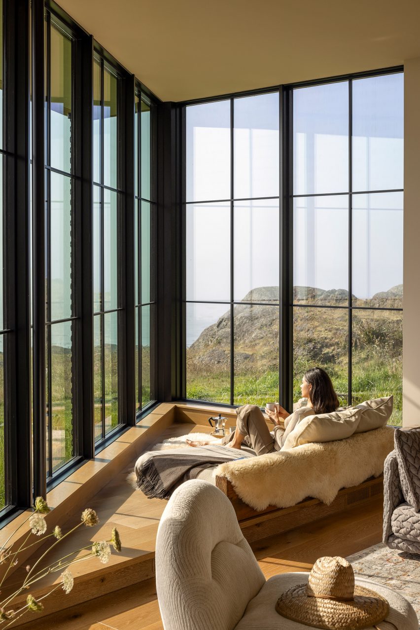 Corner window of a home overlooking the coast