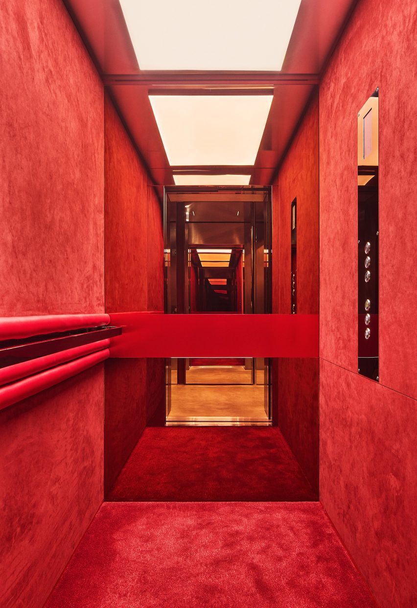 Shop interior with metallic, leather and red accents