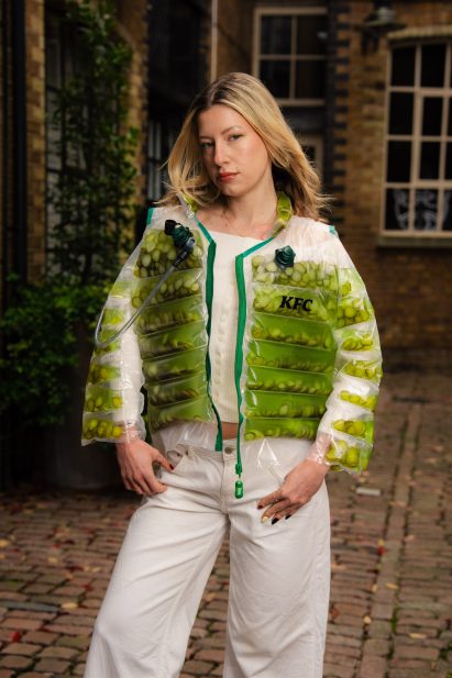 Model wearing KFC Pickle Puffer