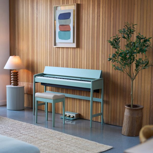 Colourful piano against wood wall