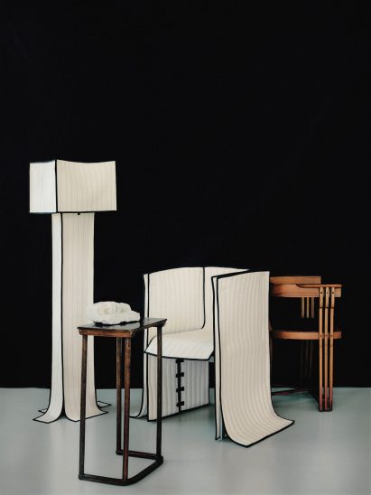 Fabric furniture against a black background