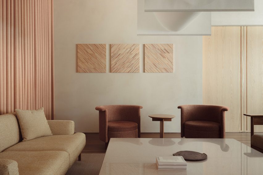 Sofa and chairs around grey table