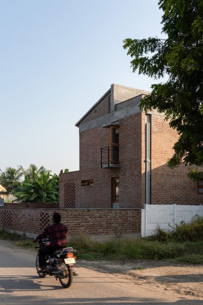 Exterior view of farmhouse by Madras Spaces