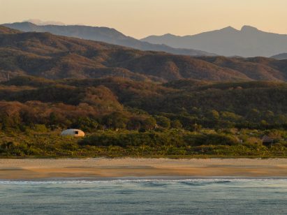View from the water of OMA Mushroom Pavilion dome in Oaxaca