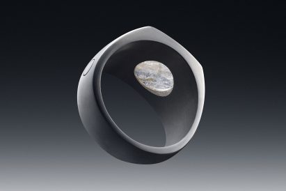 Image of the underside of the Quartz ring, showing the intricate patterns within the stone embedded in a cut-out on the top