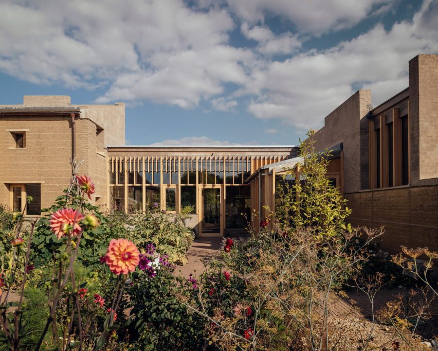 Courtyard of Rammed Earth House by Tuckey Design