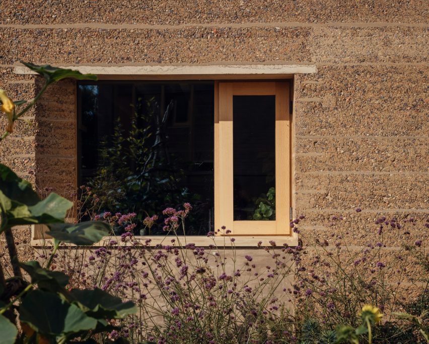 Window of Rammed Earth House by Tuckey Design