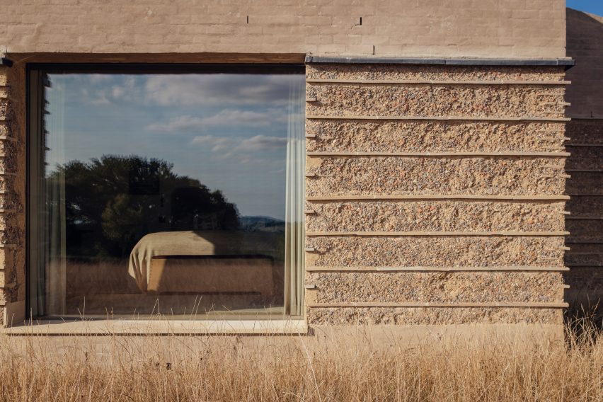 Window of Rammed Earth House by Tuckey Design