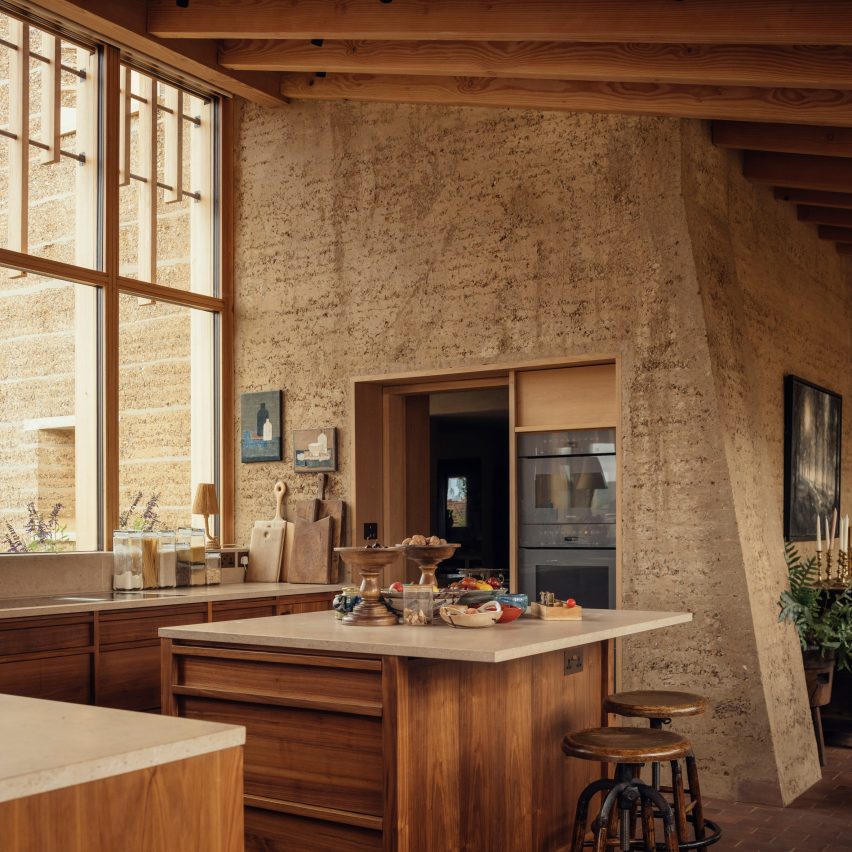 Kitchen of Rammed Earth House by Tuckey Design