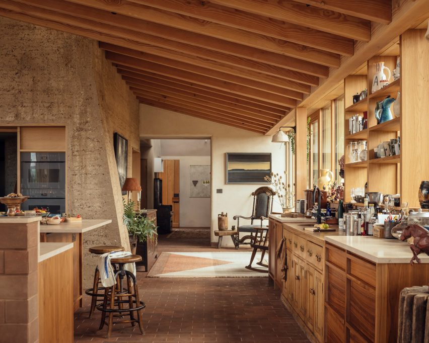 Kitchen of Rammed Earth House by Tuckey Design
