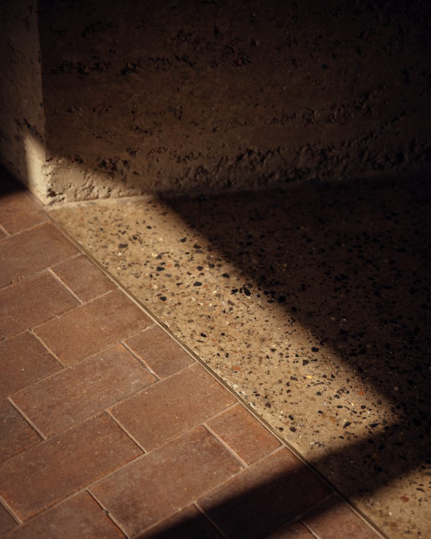 Floor of Rammed Earth House by Tuckey Design