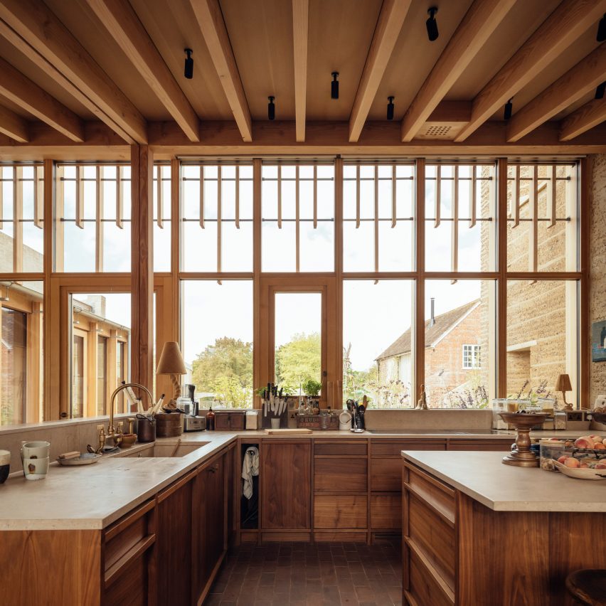 Kitchen of Rammed Earth House by Tuckey Design